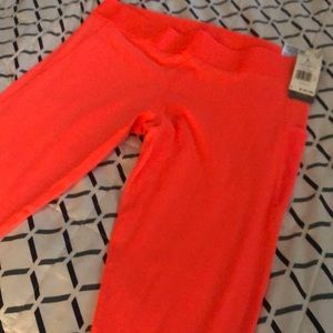 Adidas bring orange leggings size Large. Very comfortable 1 pocket on the side.